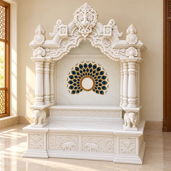 Ganesha Crest Marble Mandir with Peacock Inlay and Carved Supports shown in an illustrative Indian pooja room setting