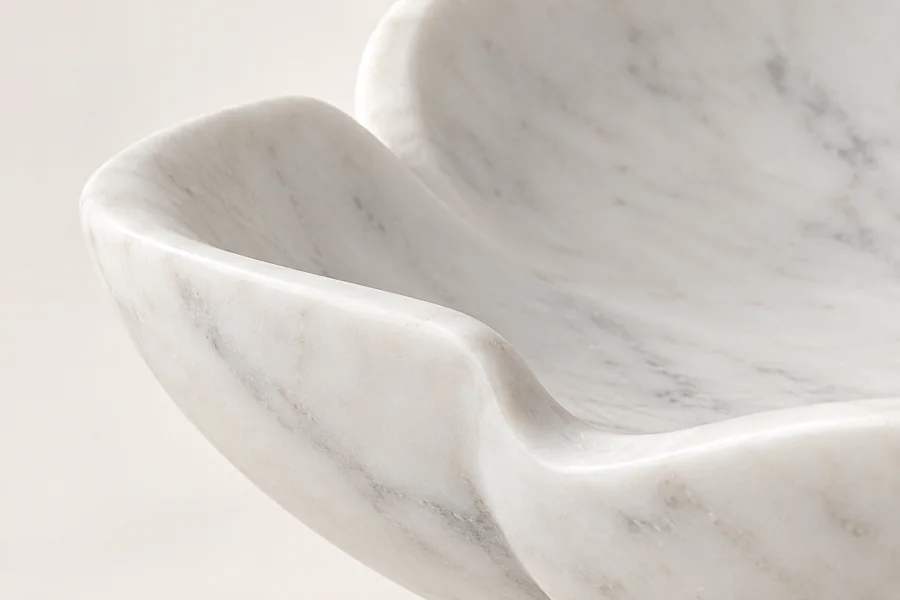 Petal Spillway Marble Garden Bowl — close view of the lowered petal lip joining the curved inner basin