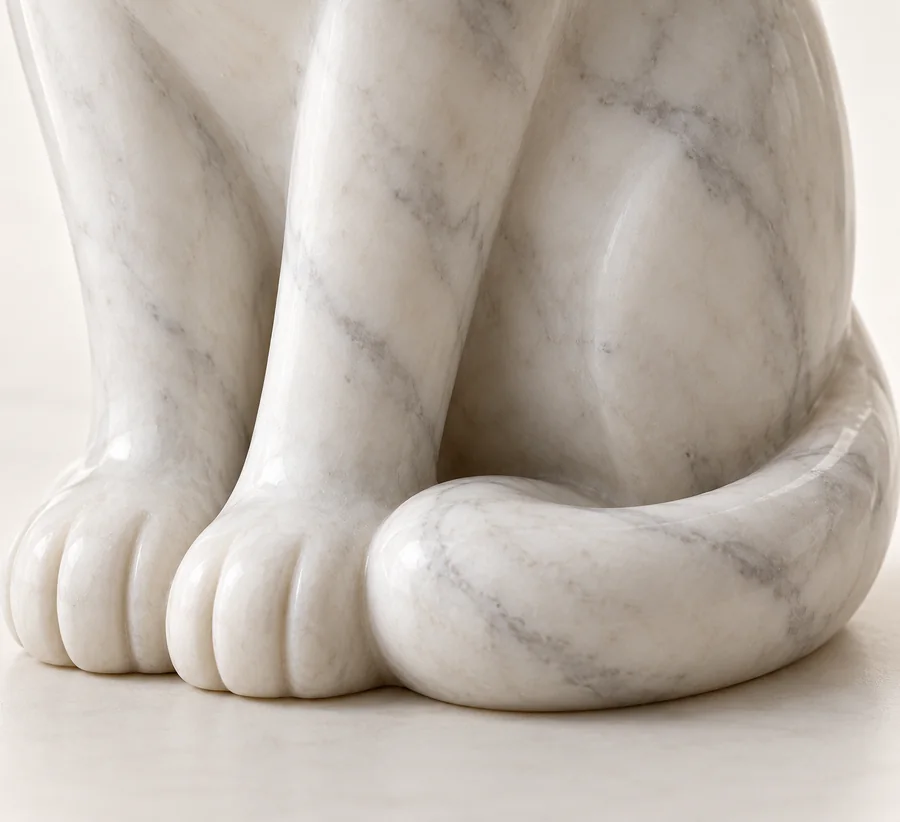 Seated Cat Marble Figurine — close view of the curled tail beside the front feet